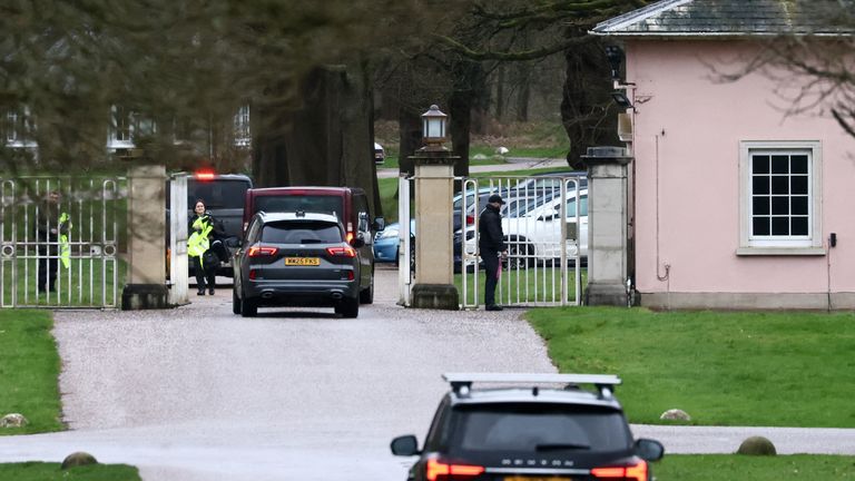 Unmarked police cars drive into Royal Lodge on 22 February, 2026. Pic: Reuters