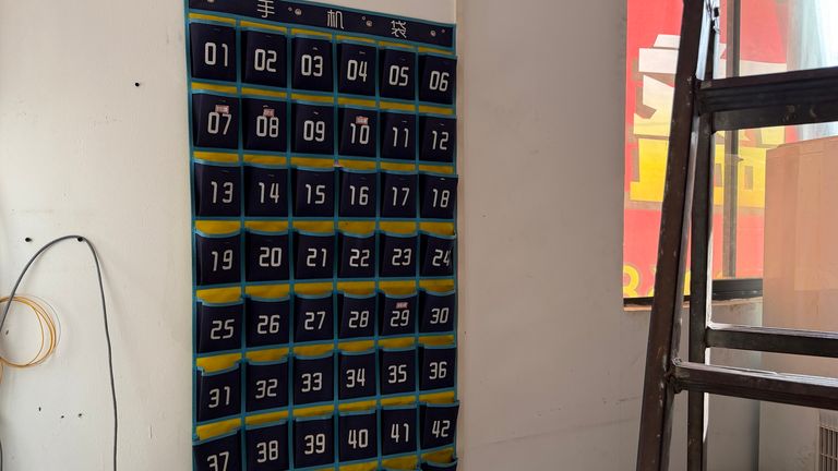 Workers had to put their phones in one of these pouches