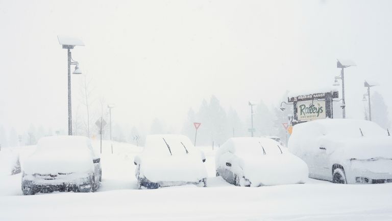 Cars covered in snow during the storm. Pic: AP