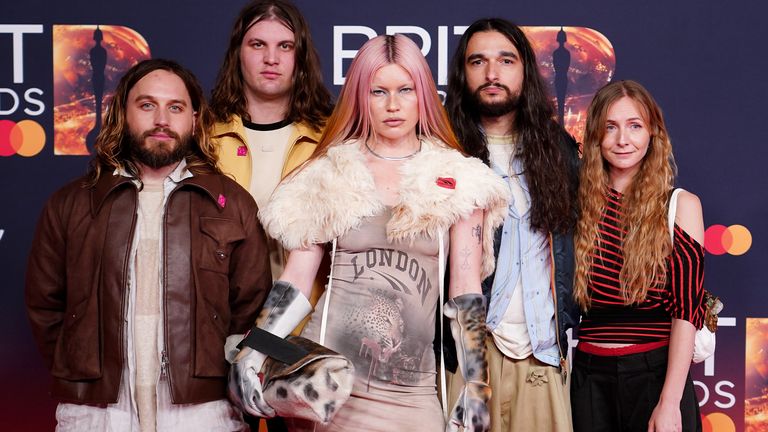 English indie band Wet Leg led by Rhian Teasdale in her London dress (it really should say Manchester shouldn't it?). Pic: PA