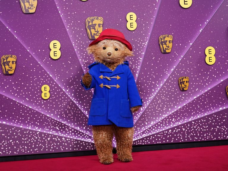 Paddington Bear, sporting a blue duffle coat and red hat (marmalade sandwich underneath, naturally). Pic: PA/ Ian West