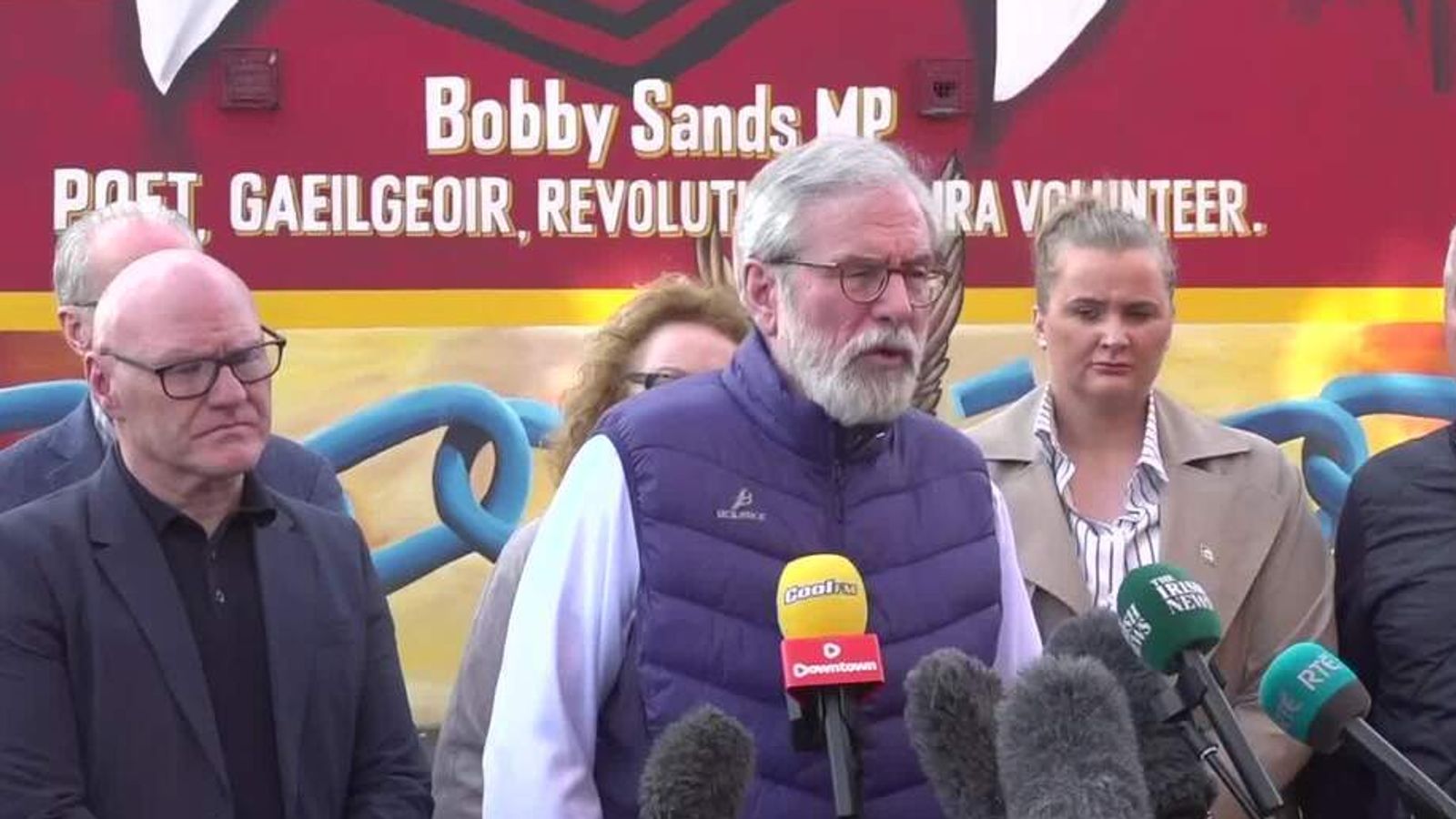 Gerry Adams reacts to case withdrawal