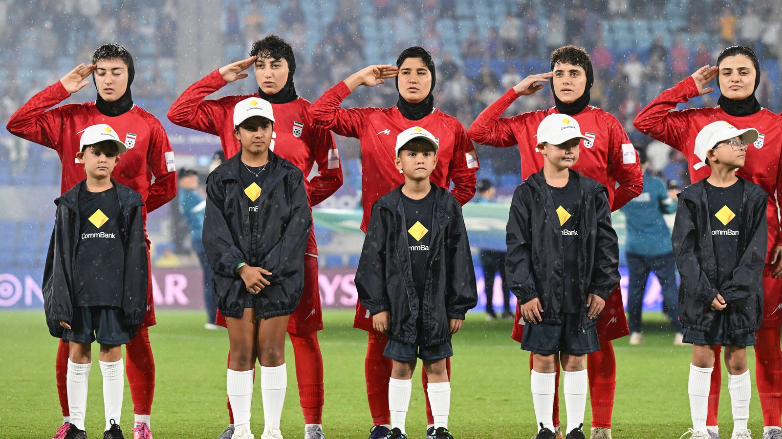 Fears Iranian women’s football team could ‘face dire consequences’ over national anthem