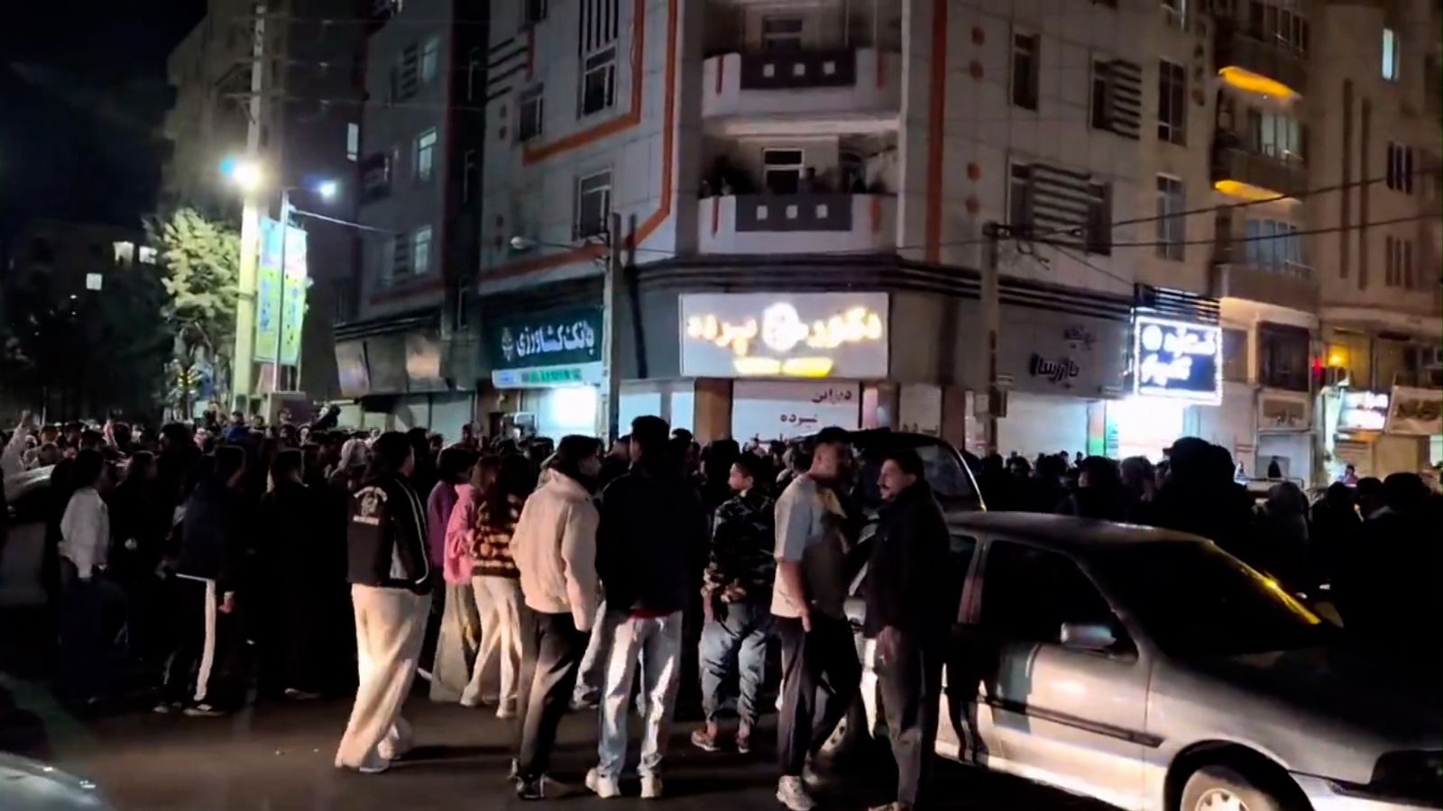 Iranians take to streets with different reactions to death of supreme leader Ali Khamenei