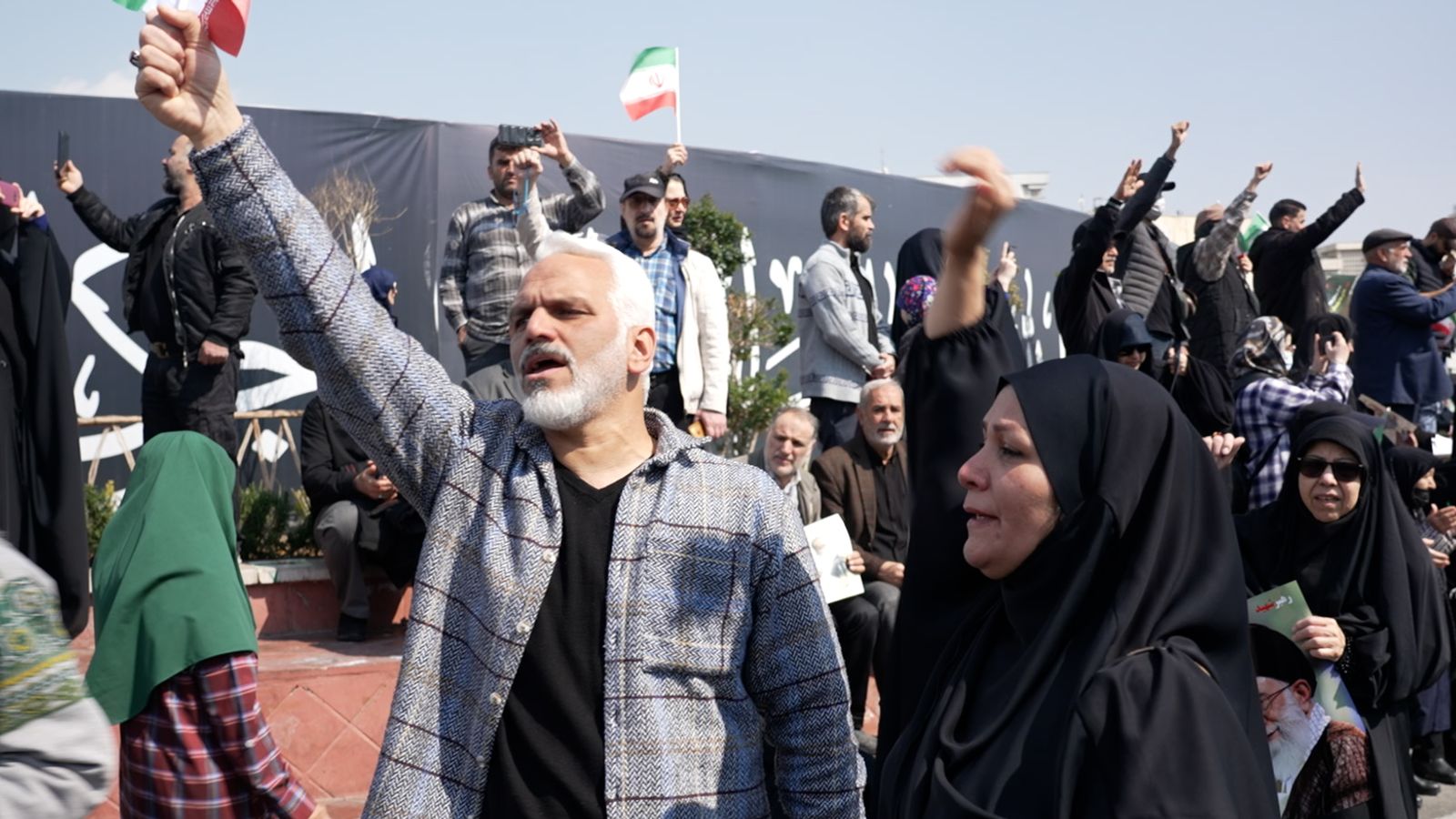Iranians defiant as thousands attend funeral for security chief Larijani and crew of sunken navy ship