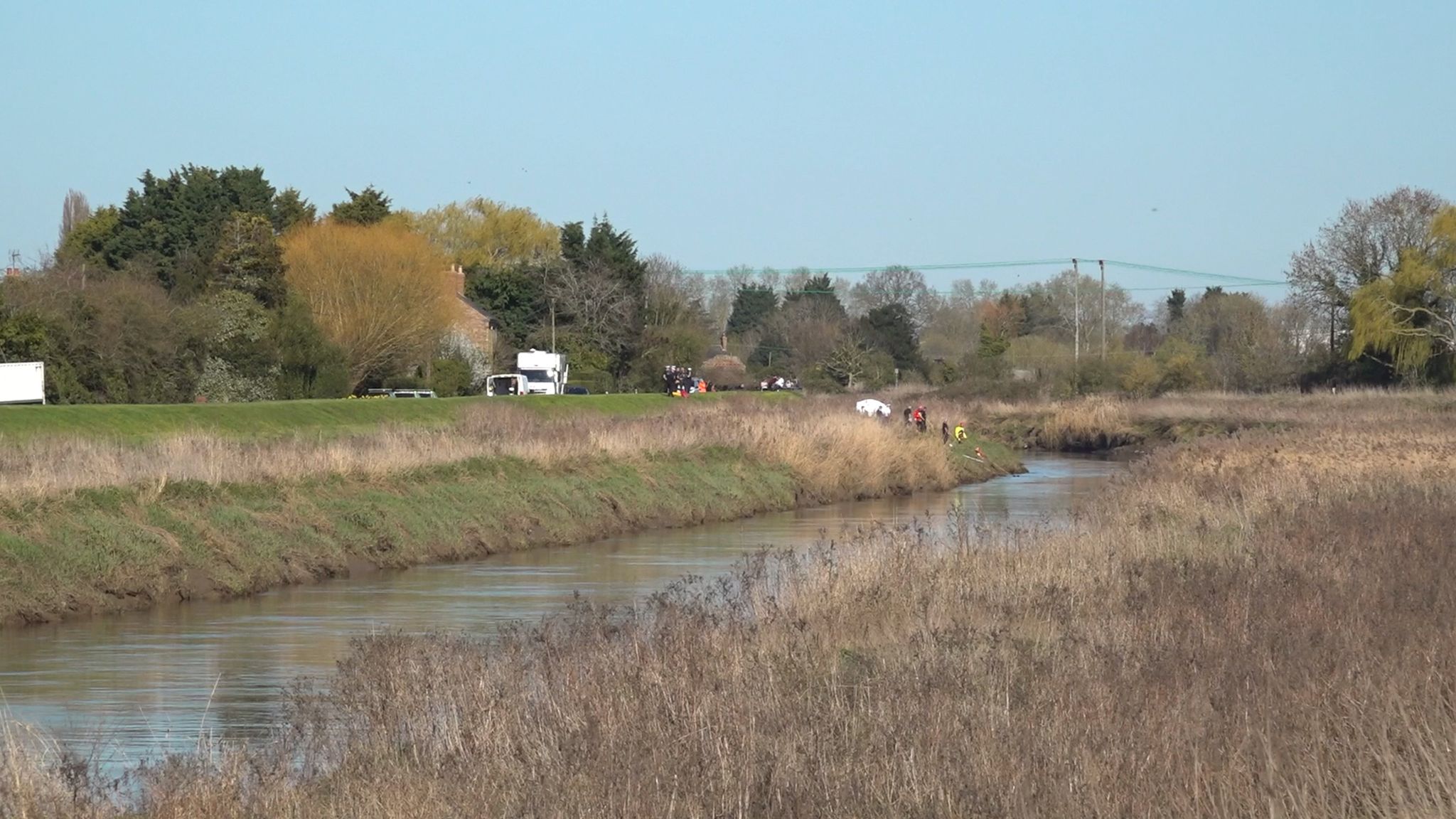 Girl's body found after car carrying five teenagers crashes into river ...