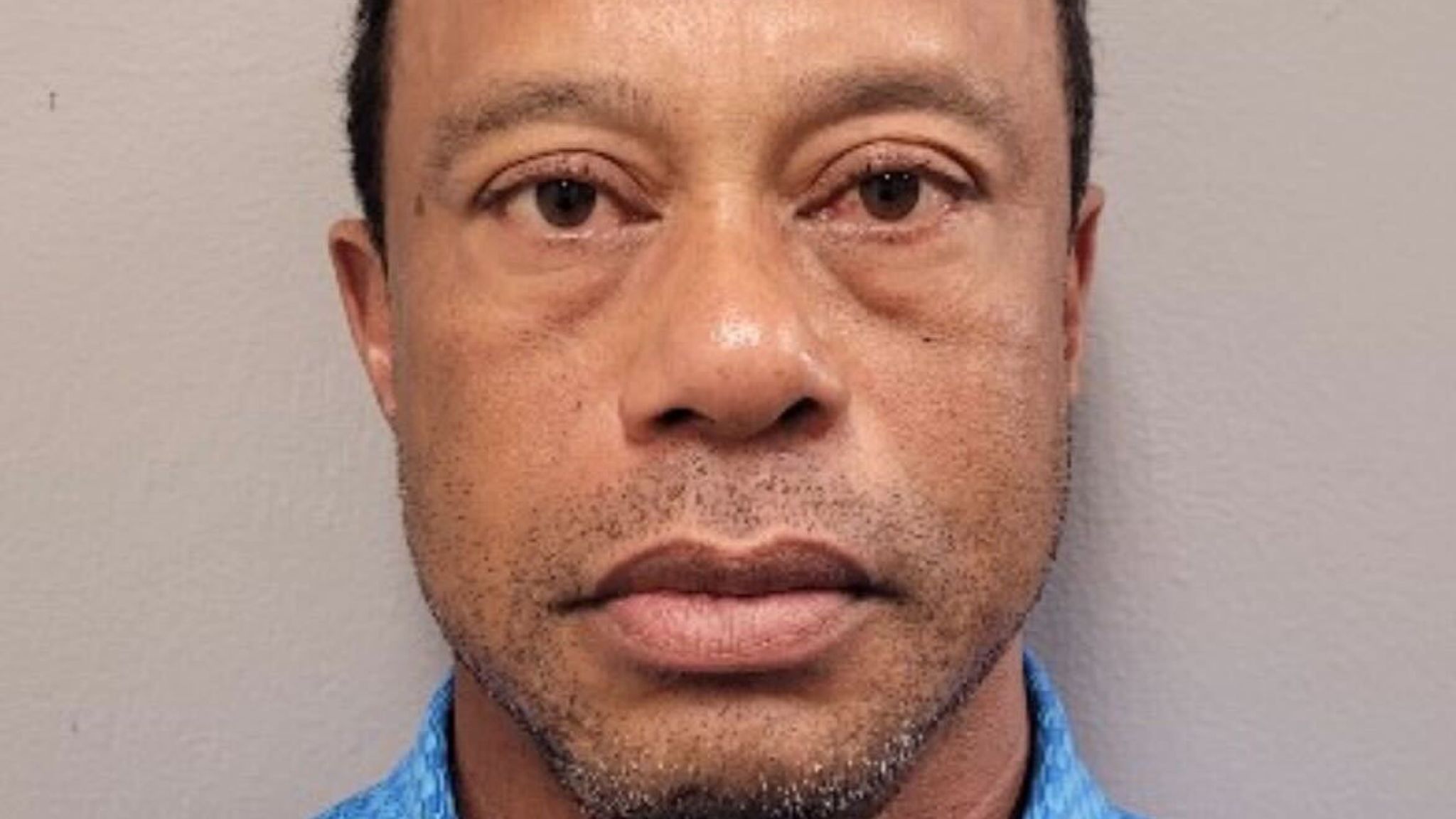 Tiger Woods' mugshot released after his arrest following dramatic car crash  | US News | Sky News
