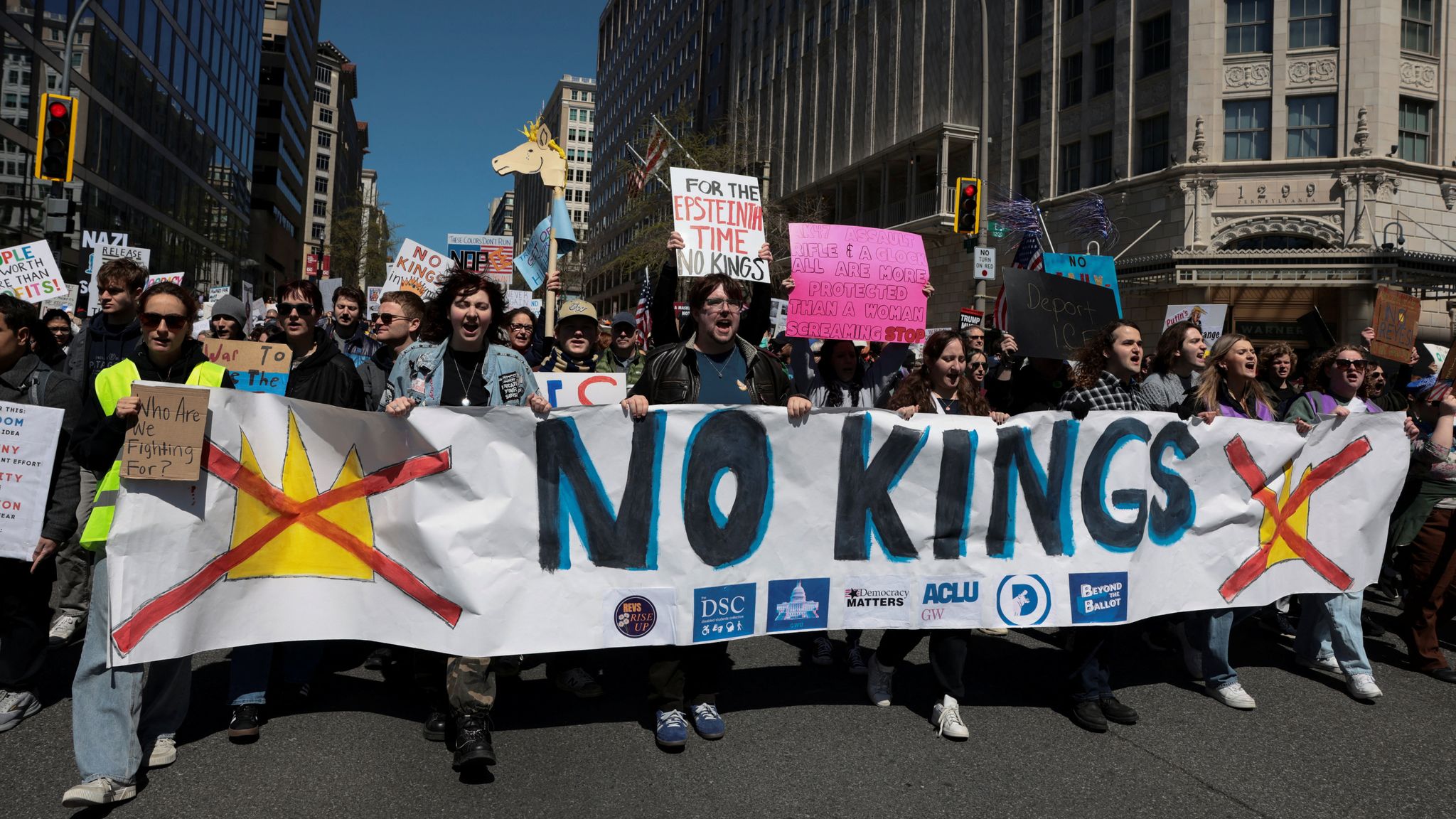 Large crowds attend 'No Kings' rallies against Trump across US | US ...