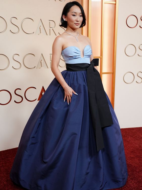 KPop Demon Hunters star Ji-young Yoo - the voice of Zoey - in hues of blue. Pic: AP