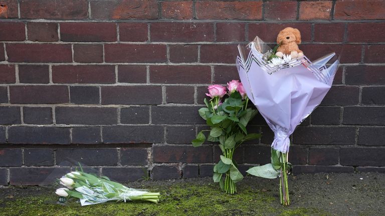 Flowers left where newborn baby girl fell to her death | UK News | Sky News Flowers left where newborn baby girl fell to her death | UK News | Sky News
