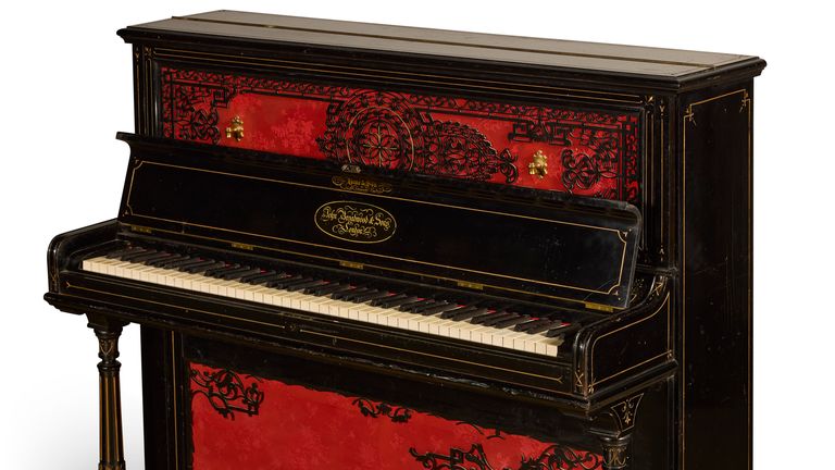 Piano used by John Lennon to write Lucy In The Sky With Diamonds breaks Beatles auction record