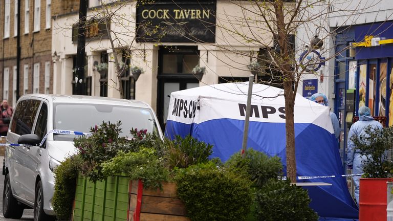 Forensic investigators at the scene in Chalton Street, Camden, London. Pic: PA