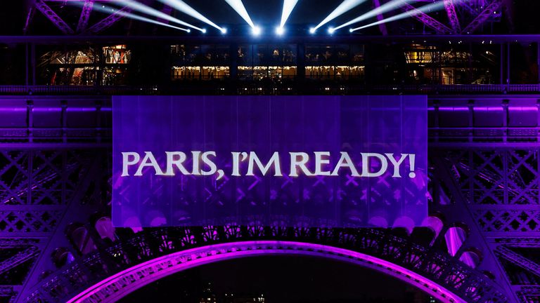 The Eiffel Tower lit up to mark the announcement. Pic: Reuters