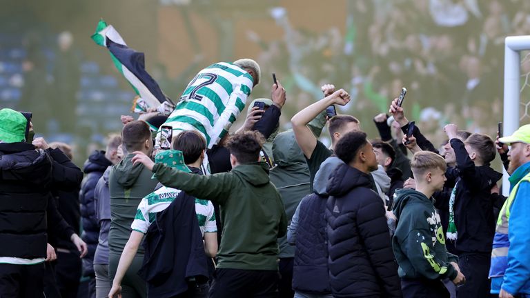 Celtic's Julian Araujo is lifted up by fans after their Scottish Cup win. Pic: PA