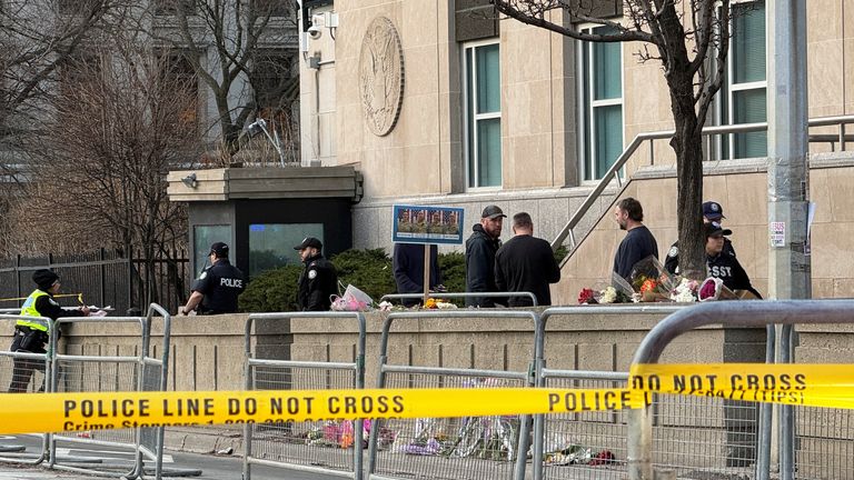 Police officers outside the US consulate. Pic: Reuters