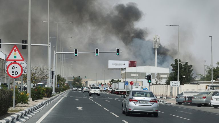 Smoke rises after reported Iranian missile attacks in Doha, Qatar, today. Pic: Reuters
