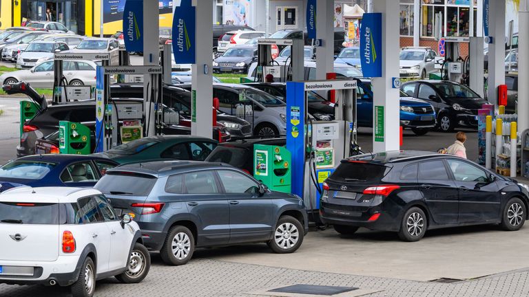 Vehicles from Germany queuing at petrol stations in Poland. Pic: AP