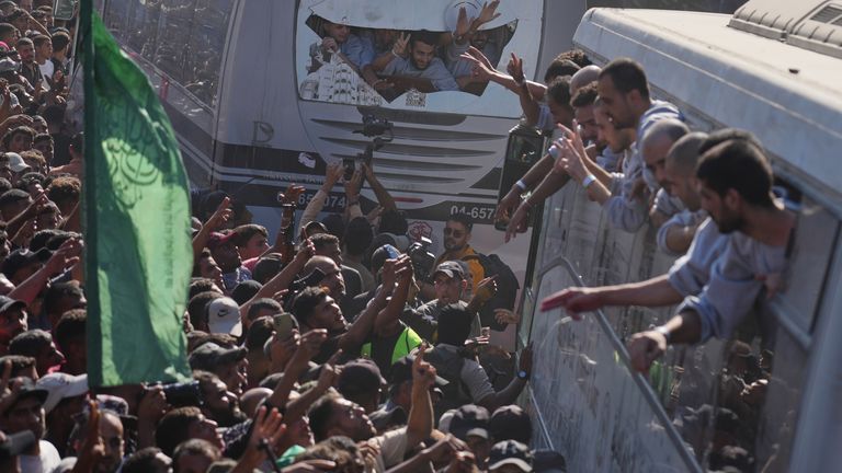 People greet Palestinian prisoners freed by Israel under a ceasefire agreement as they arrive in Gaza. File pic: AP