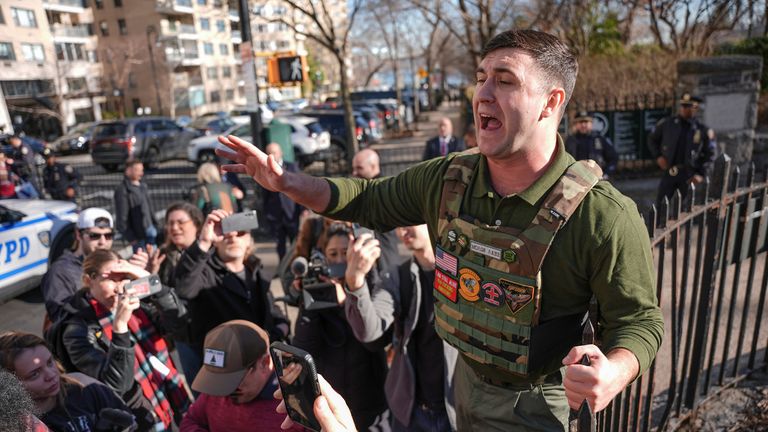 Jake Lang demonstrates near a news conference by New York's mayor and police commissioner on Monday. Pic: AP