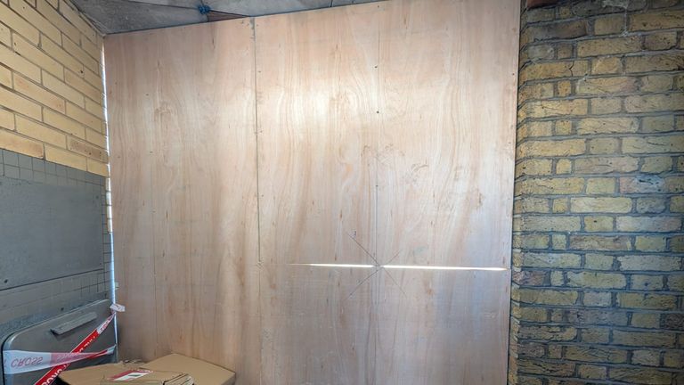 The space in front of the railings - in a communal passage - has also been boarded up. Pic: Fiona Garrett