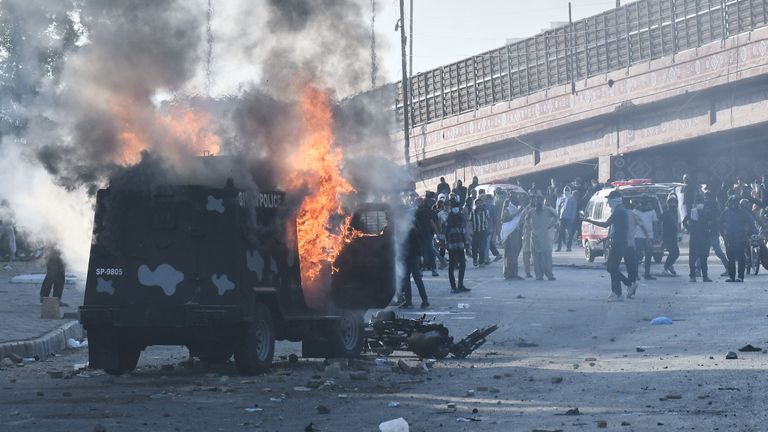 Protesters clash with police in Karachi, Pakistan. Pic: AP