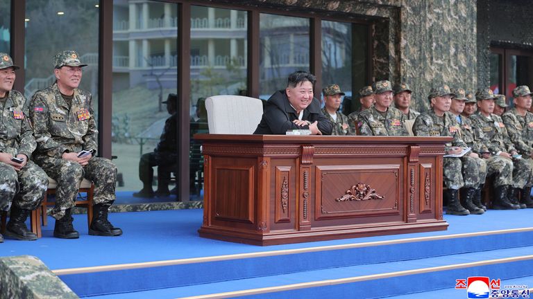 North Korea's Kim Jong Un visits a special operations training base in North Korea on 29 March. Pic: Reuters