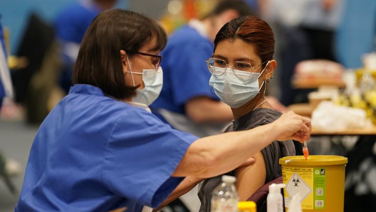 Students receiving vaccines and antibiotics from medical staff at the University of Kent. Pic: PA