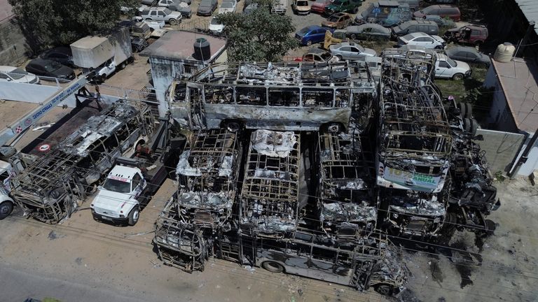 Charred vehicles used in blockades. Pic: Reuters