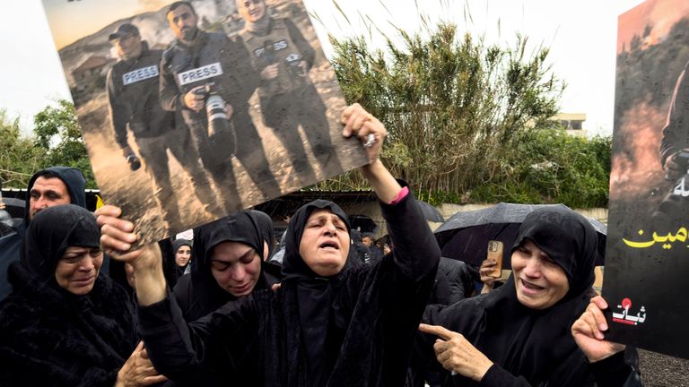 Mourners at the funeral 