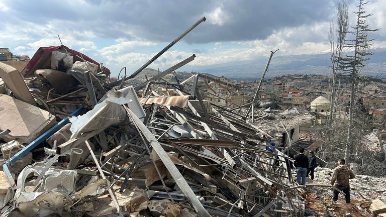 People inspect damage caused by Israeli airstrikes in Nabi Chit, eastern Lebanon. Image: AP