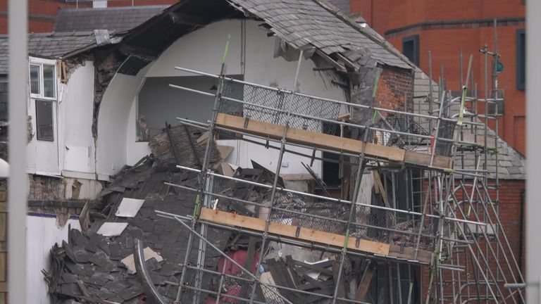 The collapsed roof of the partially-collapsed building 