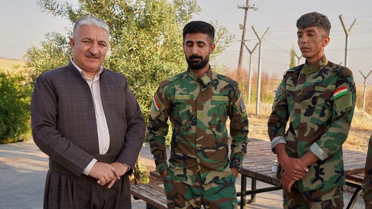 Khalil Naderi, spokesperson for the Kurdistan Freedom Party with Peshmerga fighters. File pic: AP
