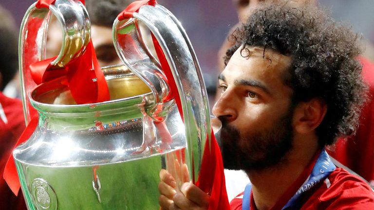 Mohamed Salah kisses the Champions League trophy in 2019. Pic: Reuters