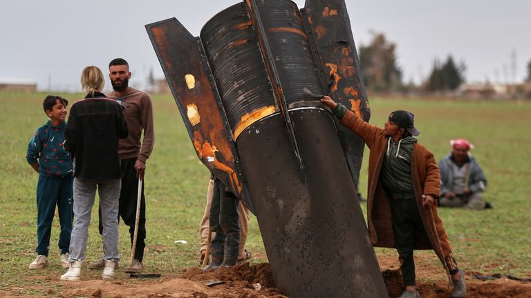 An unexploded missile near Qamishli in eastern Syria. Pic: AP