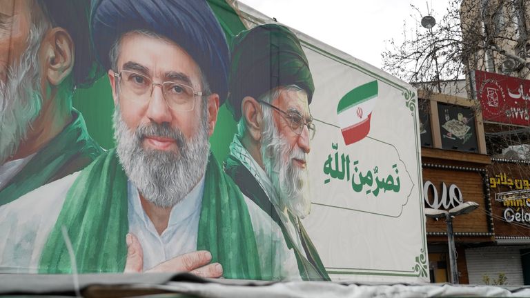 The face of Iran's Supreme Leader, Mojtaba Khamenei, and his assassinated father are ubiquitous in Tehran