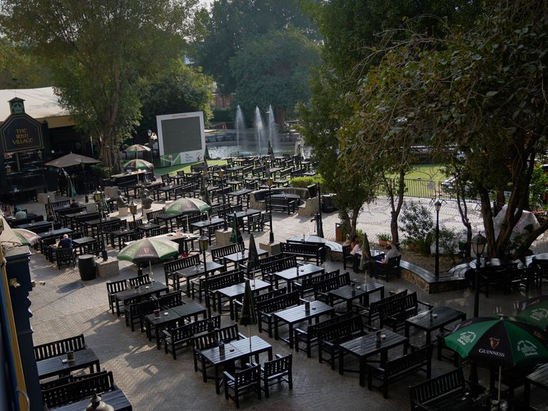 A Dubai beer garden sitting almost empty amid ongoing hostilities with Iran. Pic: AP