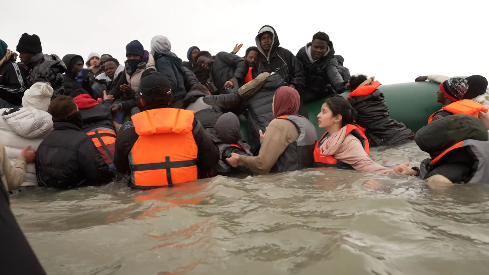 Migrants rush to board overloaded dinghy in France | World News | Sky News