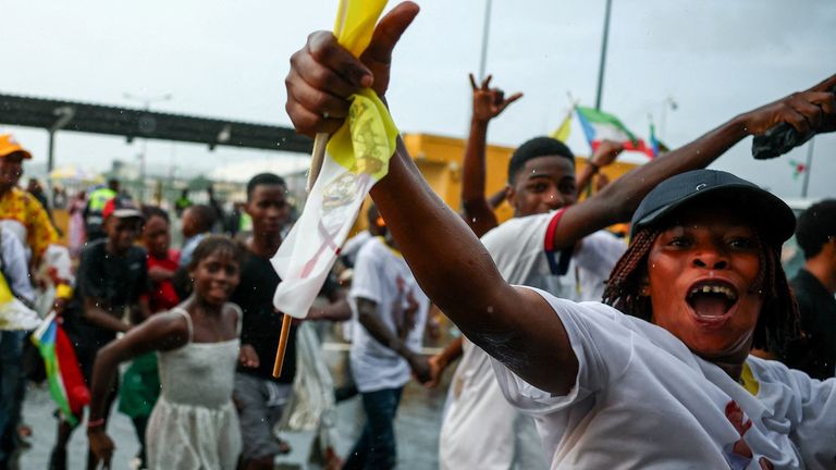 People run to enter Bata Stadium. Pic: Reuters