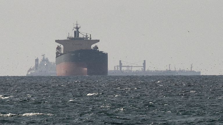 Cargo ships in the Gulf, near the Strait of Hormuz in March. Pic: Reuters
