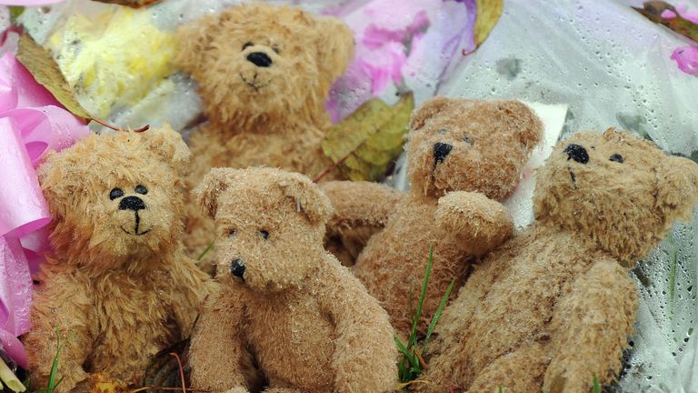 Teddies left outside the home of doctor Sabah Usmani, who died along with her five children in a fire in 2012. File pic: PA