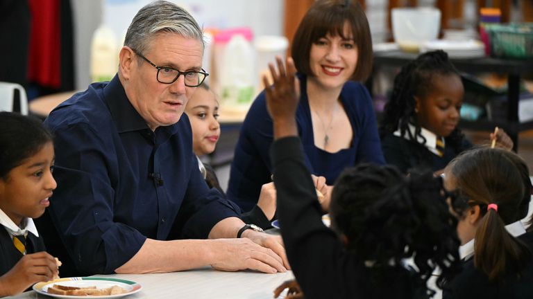 Sir Keir Starmer and Bridget Phillipson visiting a breakfast club at a school near Reading last year. Pic: PA
