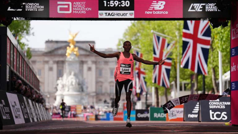 Kenya's Sawe becomes the first man to run an official marathon in under two hours to win in London. Pic: PA