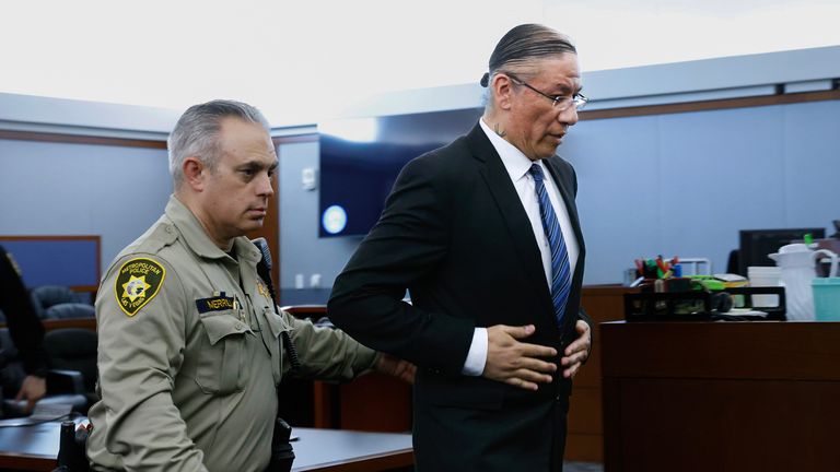 Nathan Chasing Horse being led out of court after his conviction in January. Pic: Las Vegas Review-Journal/AP