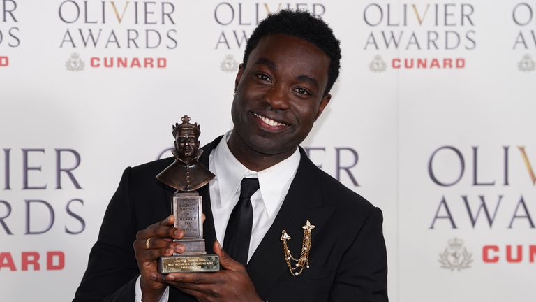 Paapa Essiedu with his best supporting actor award for All My Sons. Pic: Ian West/ PA