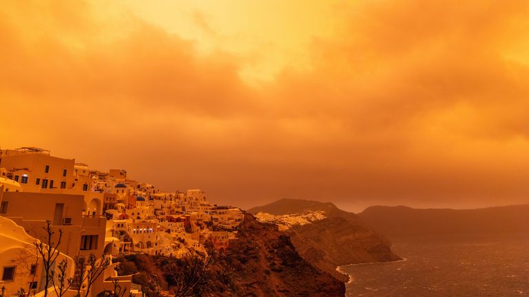 A powerful storm has also caused massive disruption in Santorini. Pic: AP