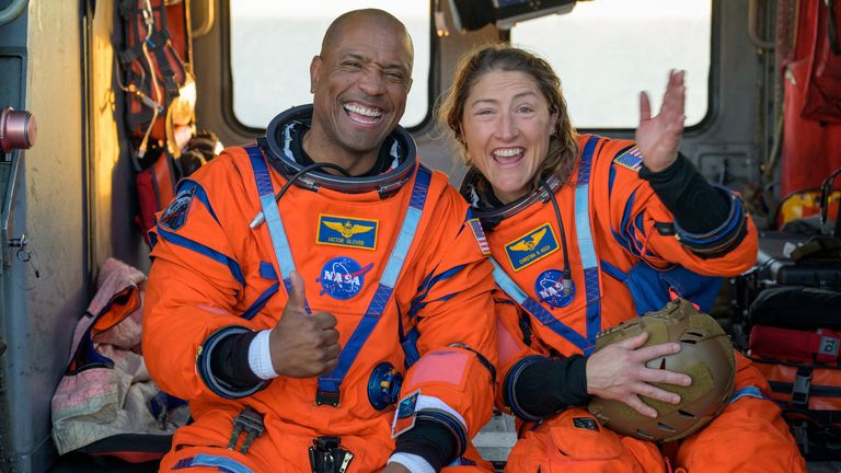Victor Glover and Christina Koch on a Navy MH-60 Seahawk. Pic: Reuters