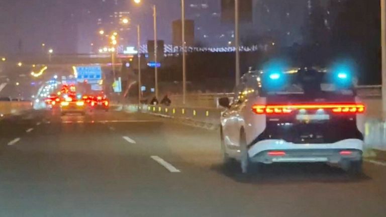 An Apollo Go robotaxi that stopped in the middle of traffic due to a system failure in Wuhan, China.
Pic: Social Media/Reuters