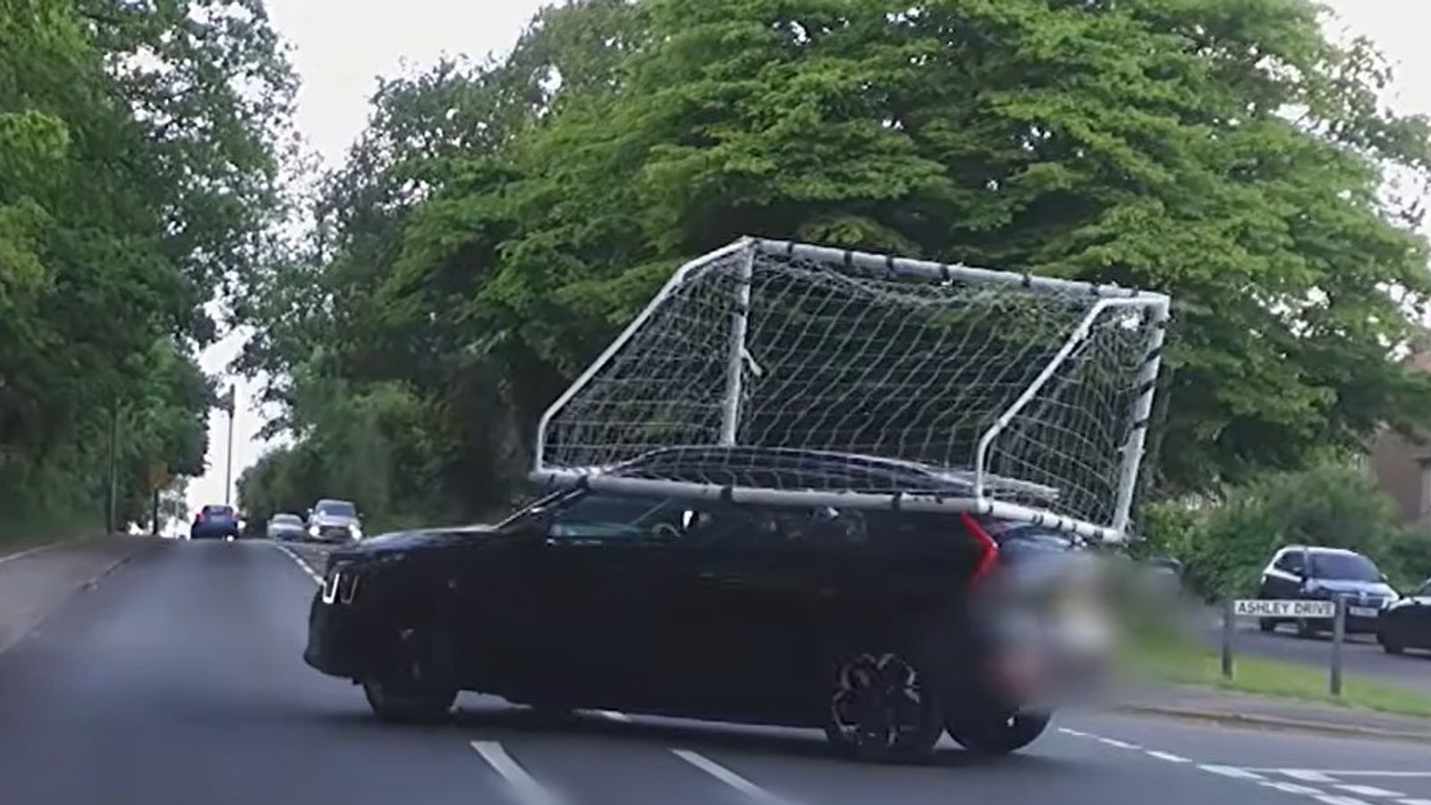 Driver filmed with football net on top of car | UK News | Sky News