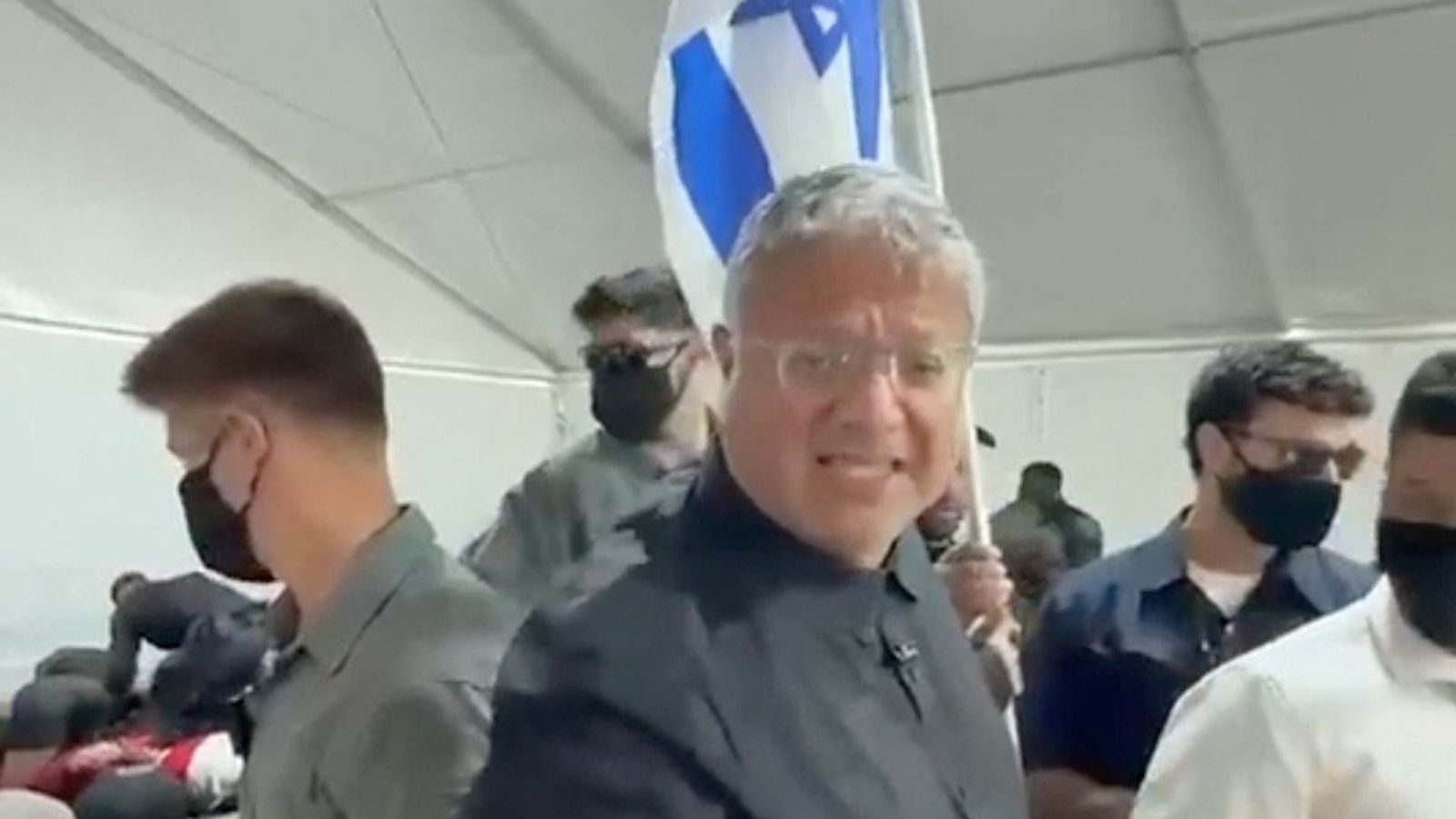 Israeli security minister taunts detained flotilla activists as police filmed forcing them to kneel | World News