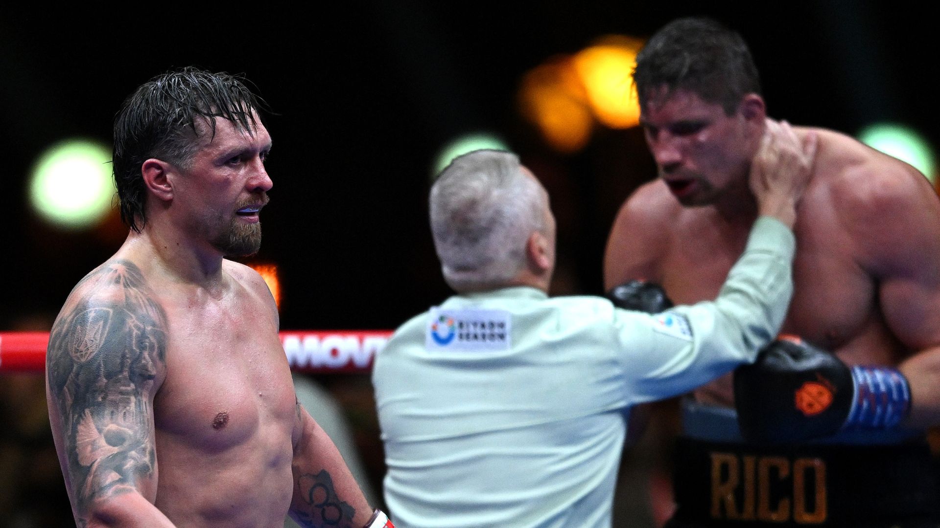 Usyk survives scare with 11th-round stoppage of Verhoeven at Pyramids